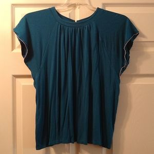 Blouse with silver trim on sleeves